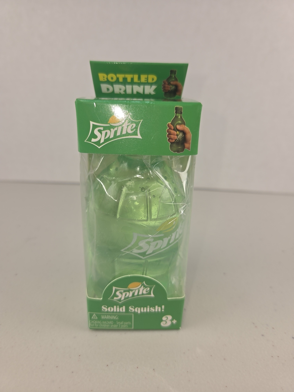 Nee Doh Sprite Green Bottled Drink Solid Squish Stress Toy - Kids Favor
